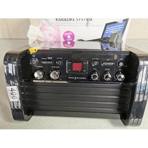 406 - Bluetooth CD+Graphics Karaoke system in box complete with all cables remote etc model EKS213/4BT.