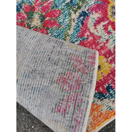 408 - A large Safavieh multicoloured rug made in Turkey, in the Monaco design, in good order with no rips ... 