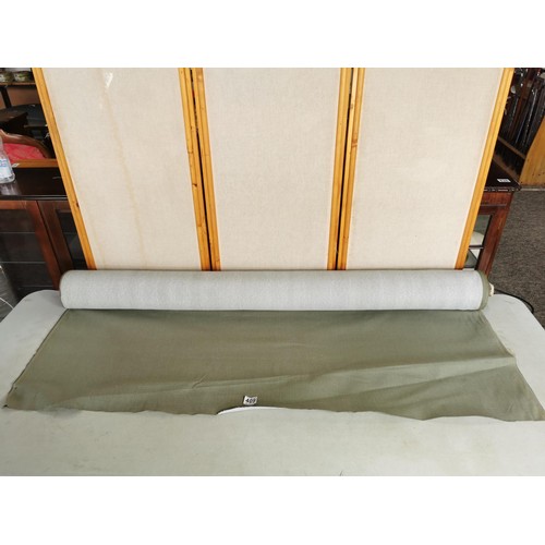 409 - Large roll of olive green material in good order ideal for reupholstering measures 147cm wide