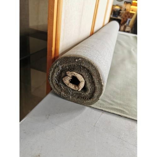 409 - Large roll of olive green material in good order ideal for reupholstering measures 147cm wide