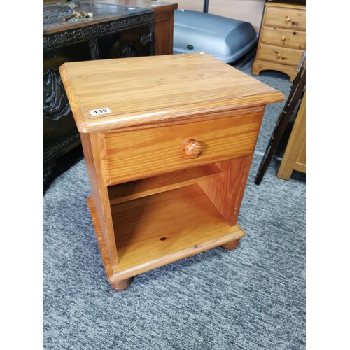 448 - Small pine one draw bed side table with a shelf at the base. Total height 59cm width of 50cm with a ... 