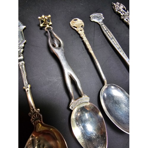 169A - A collection of 9x solid silver collectable teaspoons to include some unusual designs which includes... 