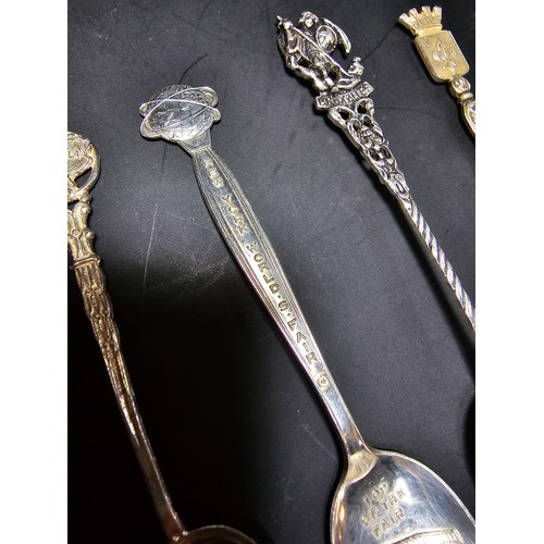 169A - A collection of 9x solid silver collectable teaspoons to include some unusual designs which includes... 