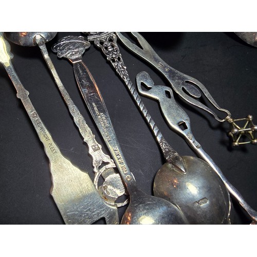 169A - A collection of 9x solid silver collectable teaspoons to include some unusual designs which includes... 