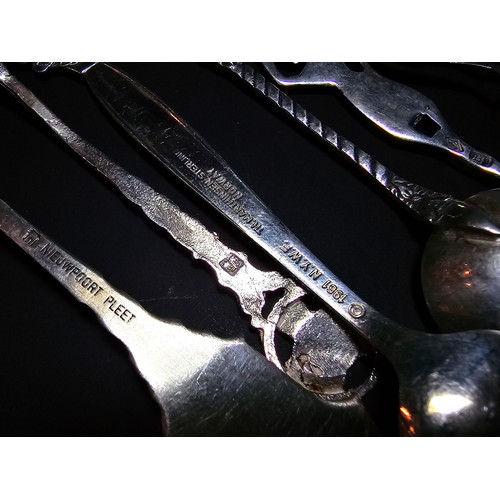 169A - A collection of 9x solid silver collectable teaspoons to include some unusual designs which includes... 