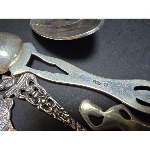 169A - A collection of 9x solid silver collectable teaspoons to include some unusual designs which includes... 