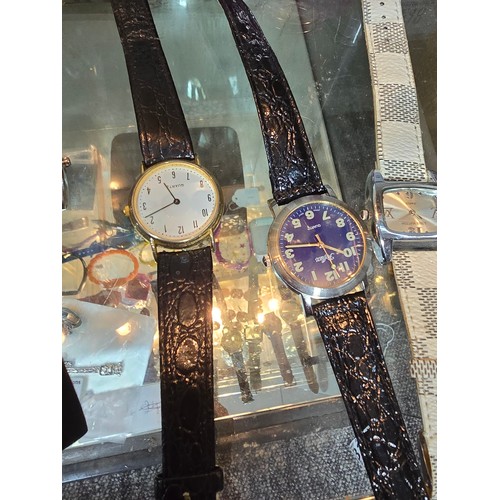 170 - A large collection of various wristwatches, mostly ladies to include some new and sealed watches mos... 