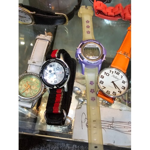 170 - A large collection of various wristwatches, mostly ladies to include some new and sealed watches mos... 