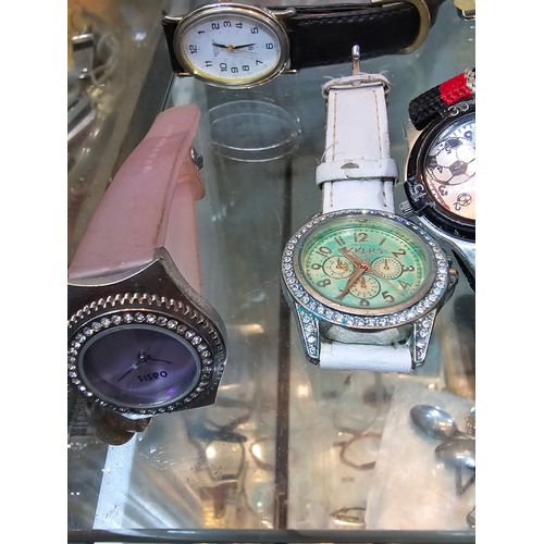 170 - A large collection of various wristwatches, mostly ladies to include some new and sealed watches mos... 