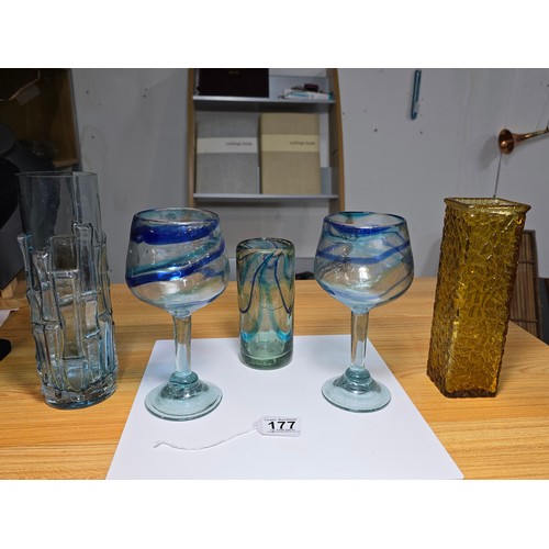 177 - A collection of good quality art glass to include a pair of impressive handblown glass goblets with ... 