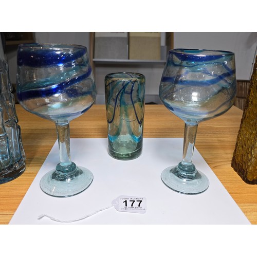 177 - A collection of good quality art glass to include a pair of impressive handblown glass goblets with ... 