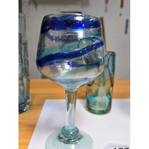 177 - A collection of good quality art glass to include a pair of impressive handblown glass goblets with ... 