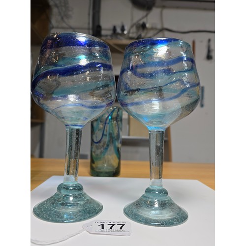 177 - A collection of good quality art glass to include a pair of impressive handblown glass goblets with ... 