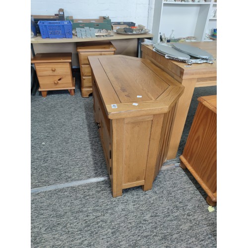 451 - Morden light oak TV unit with cupboards to the base in excellent clean condition Total height 67cm t... 