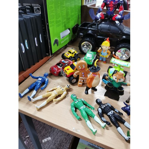 12A - A large collection of toys including die cast vehicles and figures, including many plastic McDonald ... 