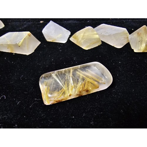 112 - A small collection of rutilated quartz specimens having beautiful gold coloured fibrous inclusions a... 