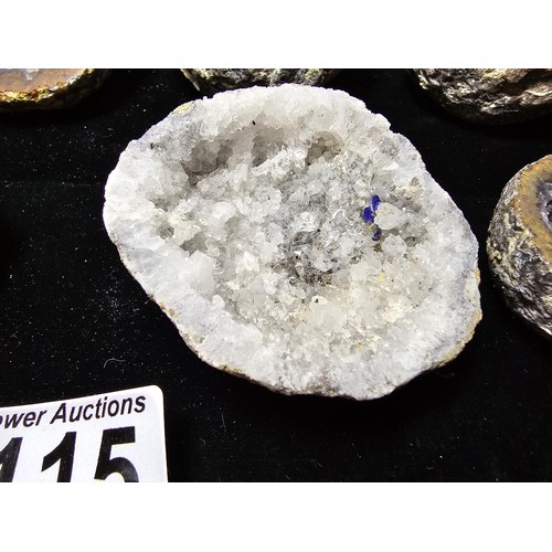 115 - A large collection of small, round geode slices presenting some stunning natural patterns inside and... 