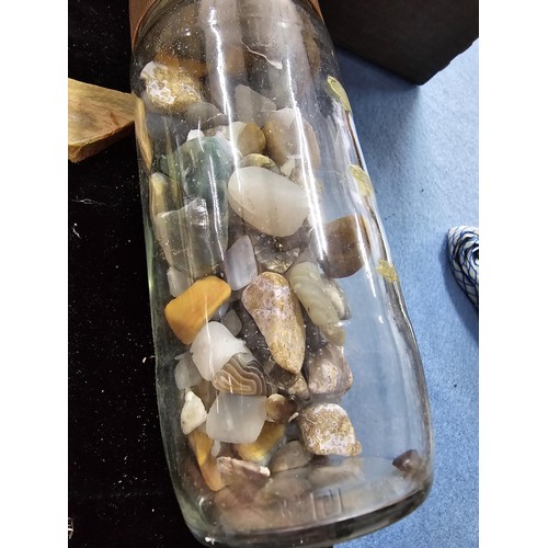 117 - A large collection of various of rocks crystal and mineral specimens along with 2 jars of polished a... 