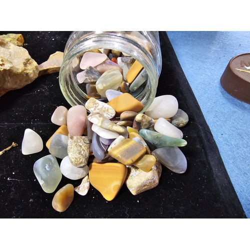 117 - A large collection of various of rocks crystal and mineral specimens along with 2 jars of polished a... 