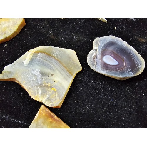 118 - A large collection of mostly various banded agate slices presenting some stunning natural patterns w... 