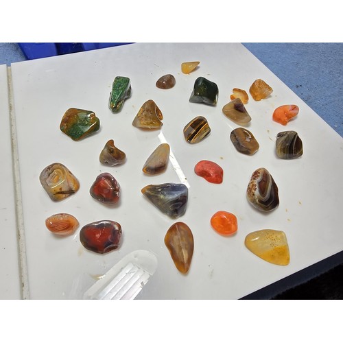 120 - A very large collection of polished and tumbled various semi precious crystal stones which included ... 