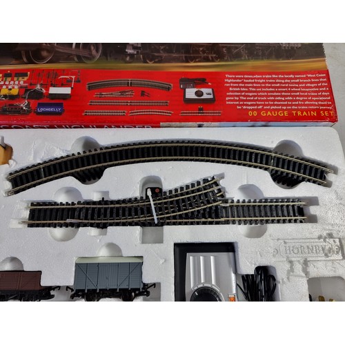 27 - Boxed Hornby R1157 West Coast Highlander train set, WCR 0-4-0 tank locomotive, four wagons, oval of ... 