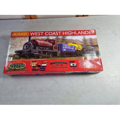 27 - Boxed Hornby R1157 West Coast Highlander train set, WCR 0-4-0 tank locomotive, four wagons, oval of ... 