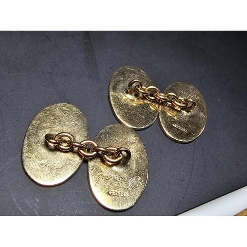 239 - Good quality pair of hallmarked 9ct. yellow gold cufflinks fitted in their original case by the Chel... 