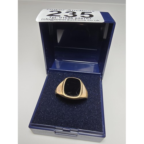 235 - Good quality vintage gents hallmarked 9ct. gold ring inset with a black onyx stone, ring is in good ... 