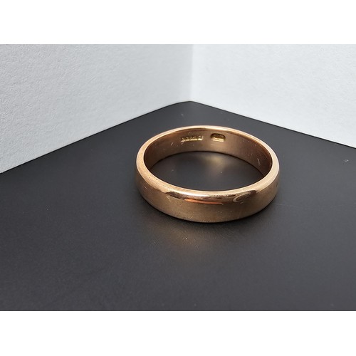 241 - Good quality chunky hallmarked 9ct. rose gold plain wedding band ring which is in excellent clean co... 