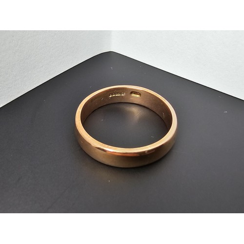 241 - Good quality chunky hallmarked 9ct. rose gold plain wedding band ring which is in excellent clean co... 