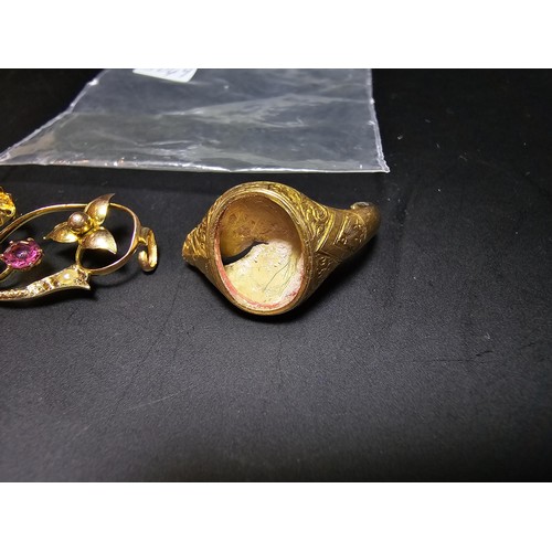245 - Small qty of scrap gold to include part of a hallmarked 15ct. gold ring, and a 9ct. hallmarked brooc... 