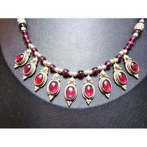 190 - An excellent quality 925 sterling silver India garnet beaded necklace featuring 9 silver drops inset... 