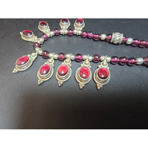 190 - An excellent quality 925 sterling silver India garnet beaded necklace featuring 9 silver drops inset... 