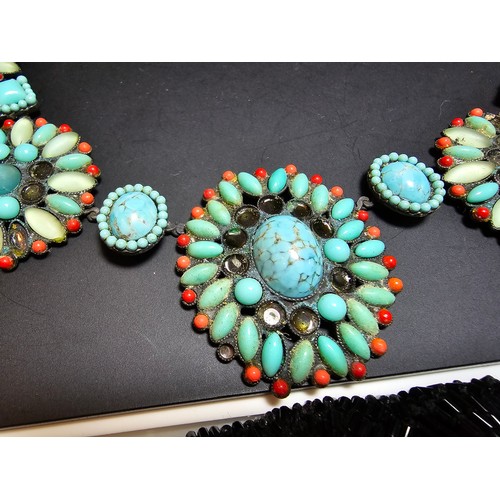 194 - A large quantity of various jewellery to include an ornate matching vintage turquoise and coral neck... 