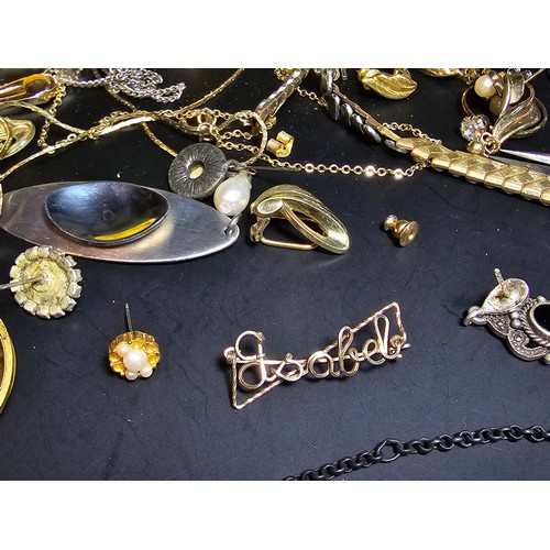 194 - A large quantity of various jewellery to include an ornate matching vintage turquoise and coral neck... 