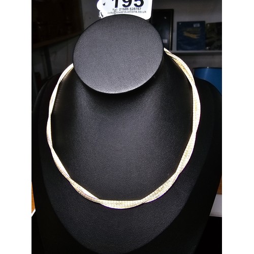 195 - A good quality 925 silver heavy double strand necklace with a locking clasp, the neck chain is of a ... 
