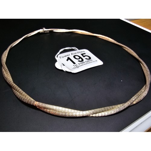 195 - A good quality 925 silver heavy double strand necklace with a locking clasp, the neck chain is of a ... 