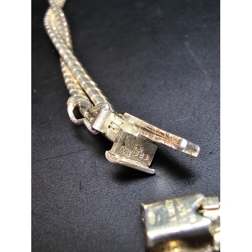 195 - A good quality 925 silver heavy double strand necklace with a locking clasp, the neck chain is of a ... 