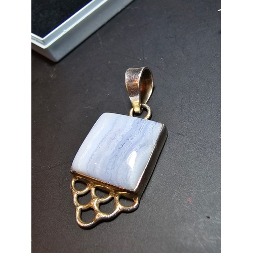 196 - A pretty 925 silver pendant inset with a large square cut blue lace agate stone along with a sterlin... 