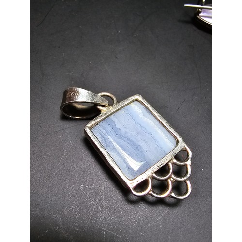 196 - A pretty 925 silver pendant inset with a large square cut blue lace agate stone along with a sterlin... 