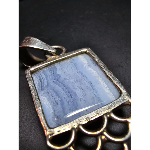 196 - A pretty 925 silver pendant inset with a large square cut blue lace agate stone along with a sterlin... 
