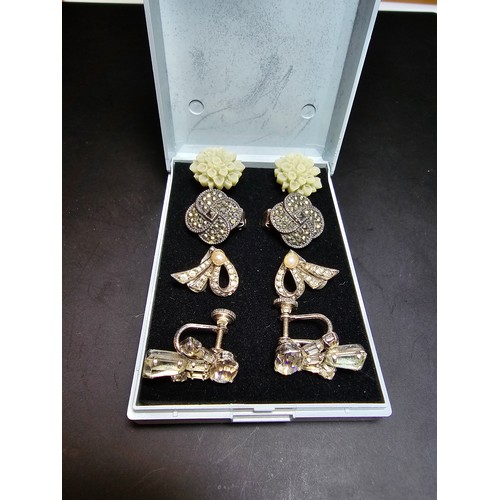 198 - A set of 4 pairs of vintage dress earrings which includes a pretty 925 silver and marcasite pair, a ... 