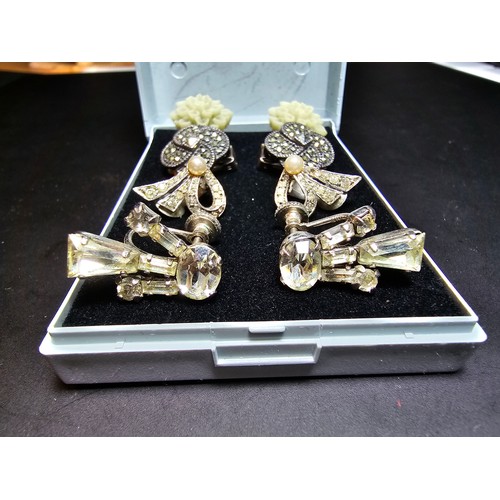 198 - A set of 4 pairs of vintage dress earrings which includes a pretty 925 silver and marcasite pair, a ... 