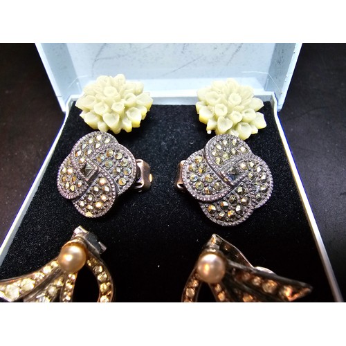 198 - A set of 4 pairs of vintage dress earrings which includes a pretty 925 silver and marcasite pair, a ... 