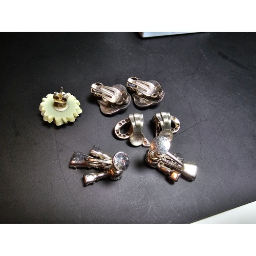 198 - A set of 4 pairs of vintage dress earrings which includes a pretty 925 silver and marcasite pair, a ... 