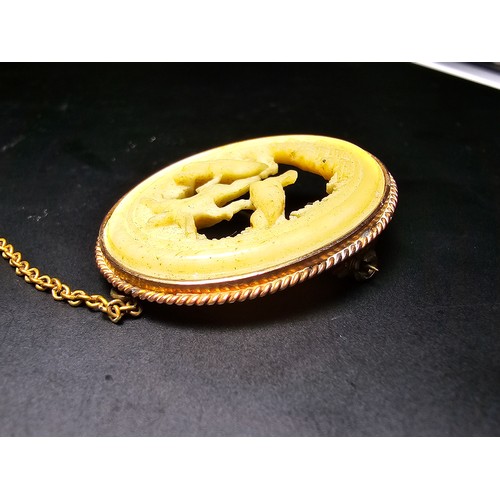 199 - 2x antique fine quality carved antler horn brooches, 1 which is mounted in 10k rose gold (tested) an... 