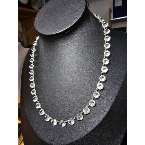 188 - A pretty necklace featuring faceted crystal glass stones all the way around, in good clean condition... 