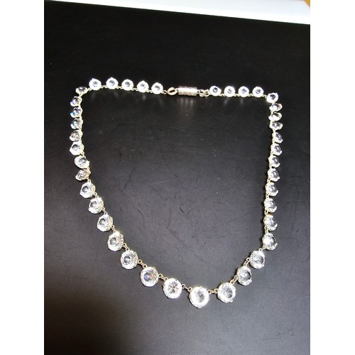 188 - A pretty necklace featuring faceted crystal glass stones all the way around, in good clean condition... 