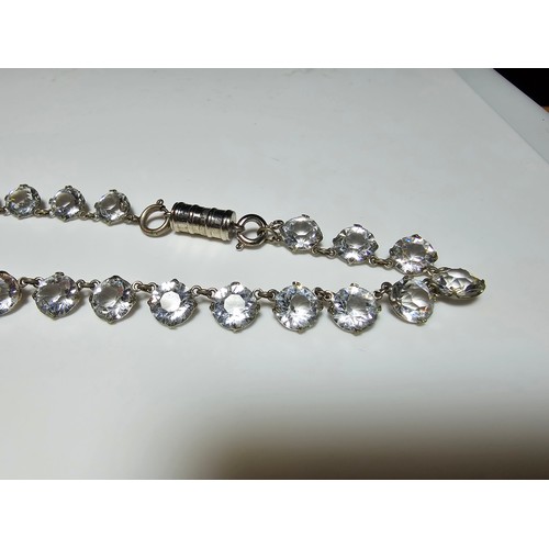 188 - A pretty necklace featuring faceted crystal glass stones all the way around, in good clean condition... 